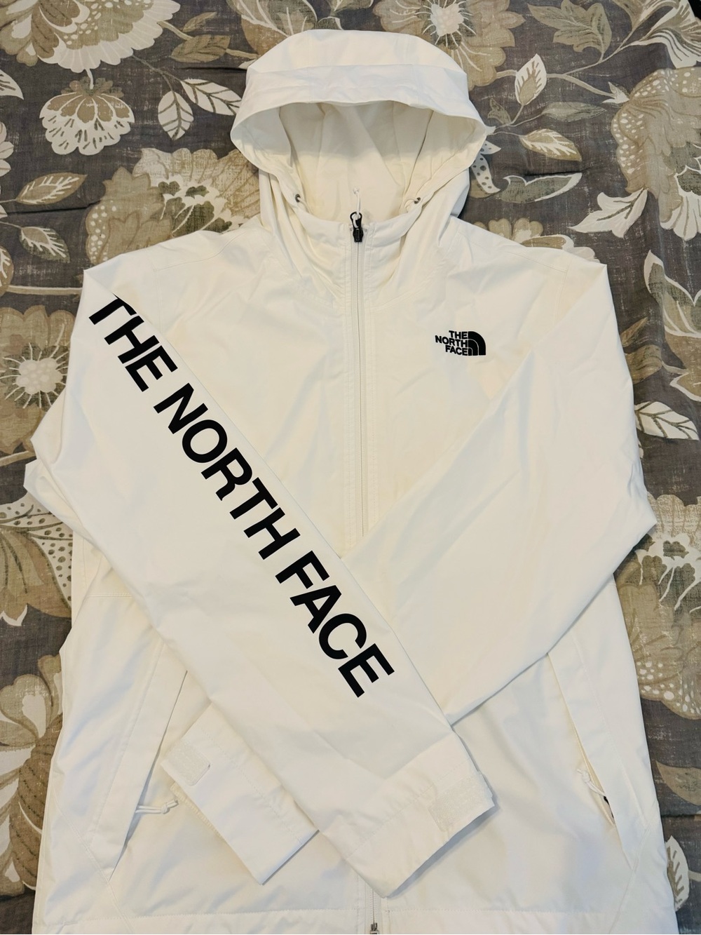 The North Face White Hooded Windbreaker with Sleeve Logo